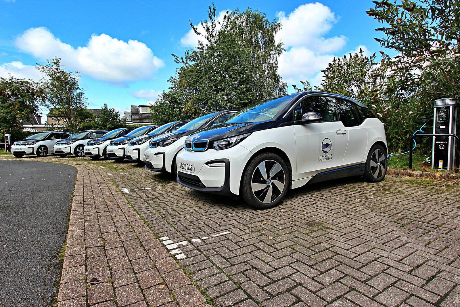 A row of fleet electric cars on charge